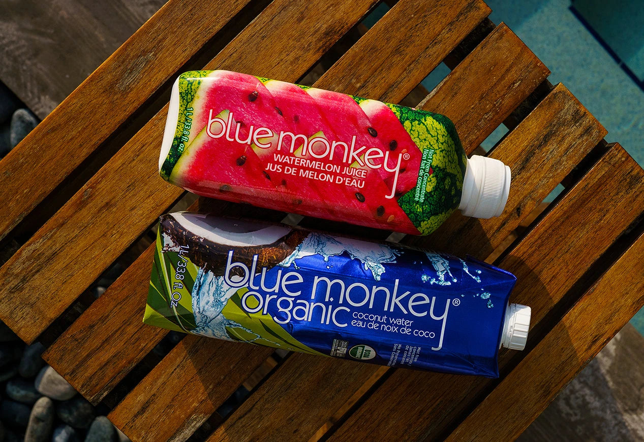 Sparkling Juice Cans on a Wood Table